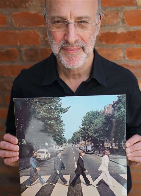 MARK LEWISOHN, a Beatles historian .